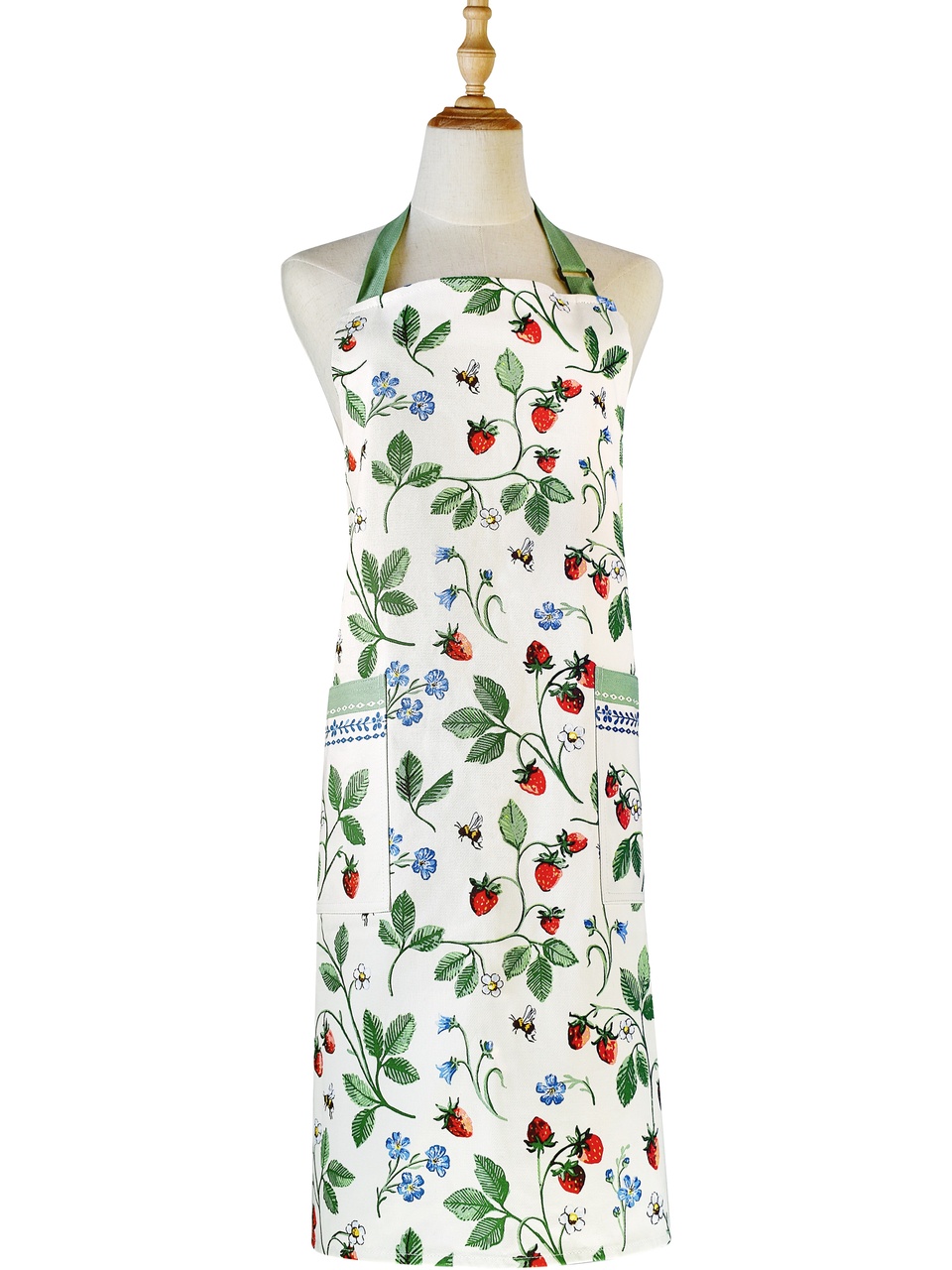 Küchenschürze aus 100% Baumwolle | Design Erdbeerbeet - strahlend rote Erdbeeren, zarte Vergissmeinnicht-Blüten und fleißige Bienchen auf sanft-cremefarbenem Hintergrund